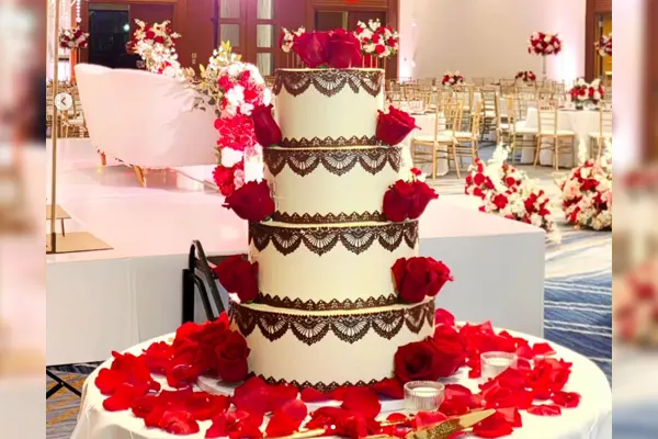 A stunning, meticulously detailed custom wedding cake designed by Haryanti at Lezat Cakes in Los Angeles, perfect for couples with dietary preferences.