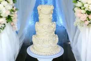 A breathtaking and meticulously detailed luxury wedding cake designed with vegan and gluten-free ingredients by Lezat Cakes in Los Angeles